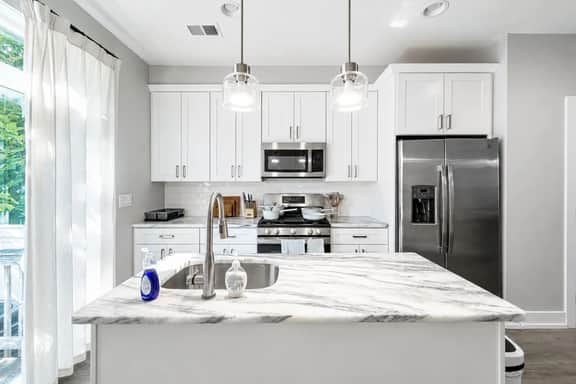 4BR Townhome w/ Rooftop & Backyard | Sleeps 8 - Image 2